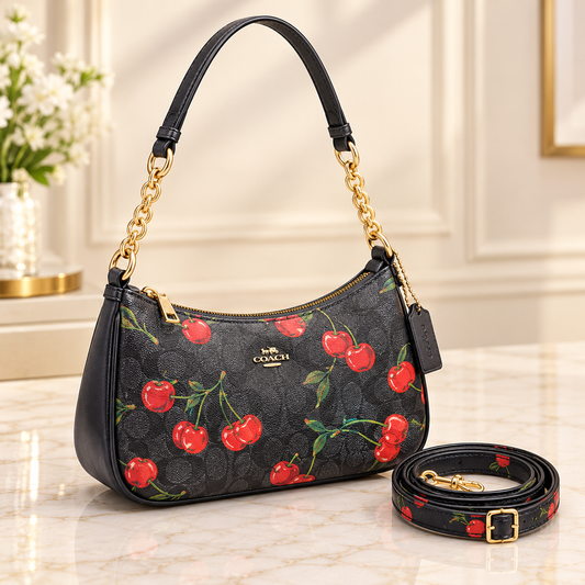 Coach black signature canvas cherry print shoulder bag with gold-tone chain strap